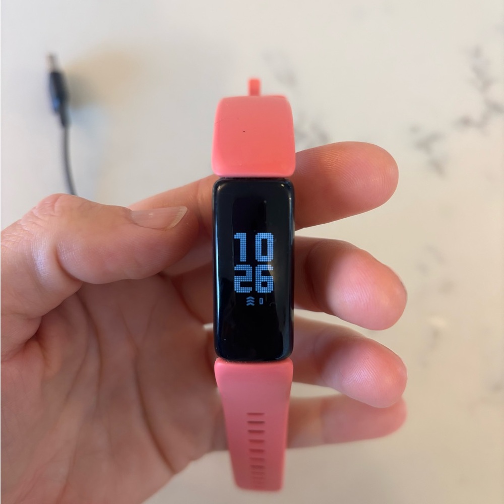 Fitbit Pink Smartwatch Sleek Design Digital Display
